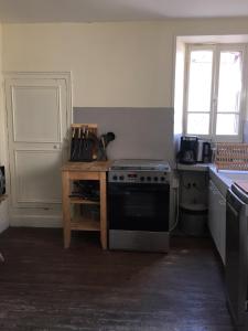 Kuchyň nebo kuchyňský kout v ubytování Maisons de Vignerons