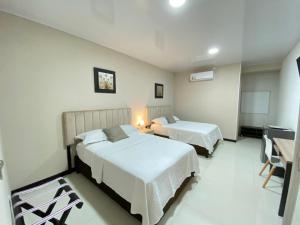 Katil atau katil-katil dalam bilik di Hotel Classic VIP +36 gambar