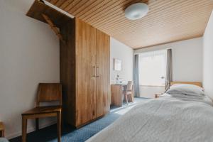Säng eller sängar i ett rum på Gasthof Sunnebad