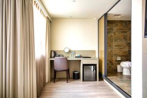 Kuchyň nebo kuchyňský kout v ubytování Hub Hotel Kaohsiung Yawan Branch