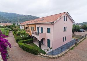 an image of a house at Castellaro Golf Resort in Castellaro