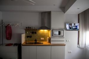 A kitchen or kitchenette at Tándem House