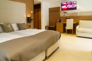 TV a/nebo společenská místnost v ubytování Hotel Bellevue