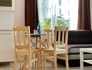 Posedenie v ubytovaní Apartamenty W Brzozowym Gaju