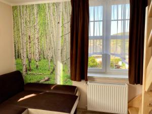 Posedenie v ubytovaní Apartamenty W Brzozowym Gaju