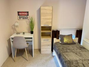 Posteľ alebo postele v izbe v ubytovaní Apartamenty W Brzozowym Gaju