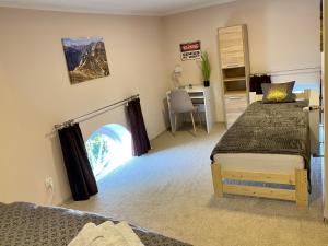Posteľ alebo postele v izbe v ubytovaní Apartamenty W Brzozowym Gaju