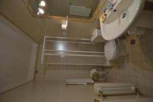 a bathroom with a sink and a mirror at Quinta do Sourinho in Barcelos