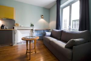 Area tempat duduk di Suites & Hôtel Helzear Montparnasse