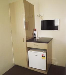 Kuchyň nebo kuchyňský kout v ubytování High Street Motor Inn