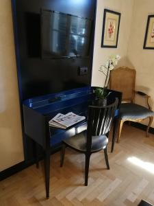 A seating area at Hotel Verdi Boutique Hotel