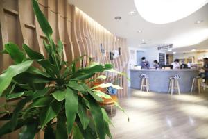 A restaurant or other place to eat at Dream 12 Hotel