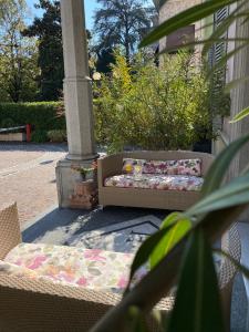 A garden outside Hotel Verdi Boutique Hotel