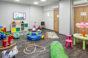 a room with many different types of play equipment at Hotel Aqua Sopot - Destigo Hotels in Sopot
