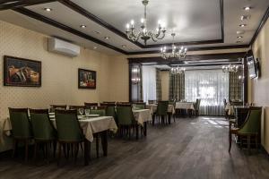 ห้องอาหารหรือที่รับประทานอาหารของ Boutique Hotel Russkaya Okhota