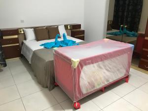 Łóżko lub łóżka w pokoju w obiekcie Ocean Pearl Apartment no4