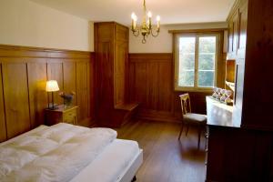 Postel nebo postele na pokoji v ubytování Kloster Dornach / Basel