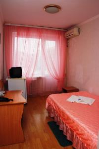 Кровать или кровати в номере Гостиница «Киев»