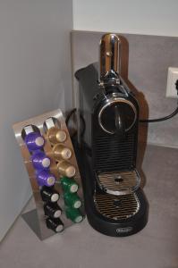 um close-up de uma torradeira com um grupo de botões em Appartment an der Wühle em Weilheim an der Teck