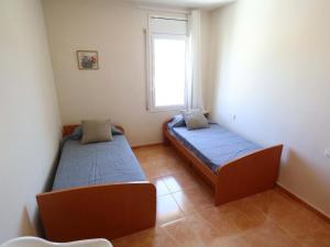 Posteľ alebo postele v izbe v ubytovaní D22145 reina elisenda