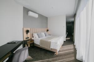 Posteľ alebo postele v izbe v ubytovaní B&B HOTEL Warsaw East