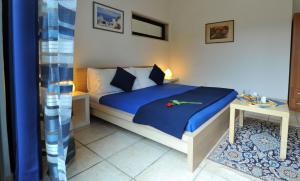 Postel nebo postele na pokoji v ubytování B&B A Casa Di Joy + 37 fotografií