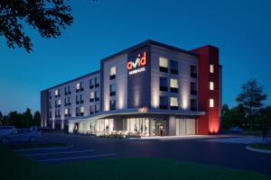 a rendering of a hotel with a sign on it at Avid Hotels - Cincinnati N - West Chester, an IHG Hotel in West Chester