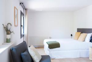 Posteľ alebo postele v izbe v ubytovaní Hotel Rural Mas de l'Illa