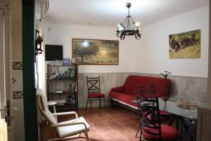 Posezení v ubytování Alojamiento y habitacionesla cañada monfrague