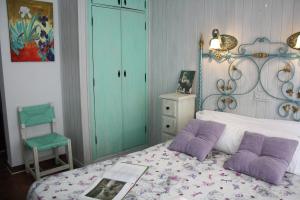 Cama o camas de una habitación en Alojamiento y habitacionesla cañada monfrague