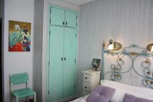 Cama o camas de una habitación en Alojamiento y habitacionesla cañada monfrague