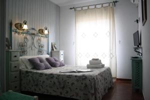 Cama o camas de una habitación en Alojamiento y habitacionesla cañada monfrague