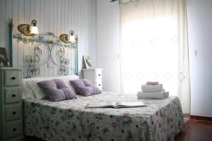 Cama o camas de una habitación en Alojamiento y habitacionesla cañada monfrague