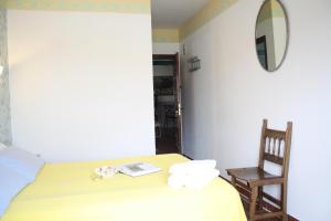 Cama o camas de una habitación en Alojamiento y habitacionesla cañada monfrague