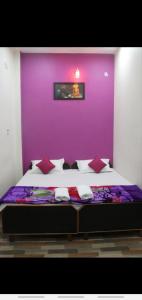 Postel nebo postele na pokoji v ubytování RELAX PAYING GUEST HOUSE