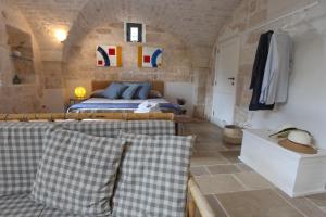Postel nebo postele na pokoji v ubytování Casina Fumarola