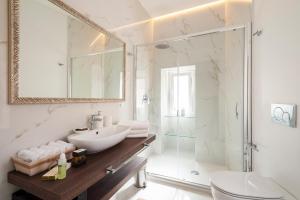 Koupelna v ubytování Porta Piccola Luxury Home + 37 fotografií