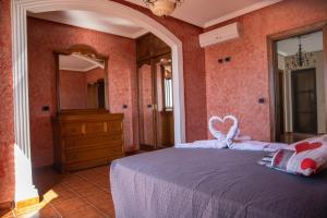 Postel nebo postele na pokoji v ubytování VILLA LAS CUEVAS