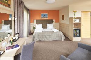 Кровать или кровати в номере Wellton Riga Hotel & SPA