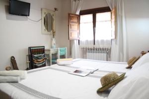 Cama o camas de una habitación en Alojamiento y habitacionesla cañada monfrague