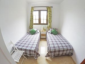 Posteľ alebo postele v izbe v ubytovaní Casa El Cercado