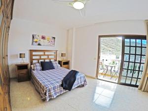 Posteľ alebo postele v izbe v ubytovaní Casa El Cercado