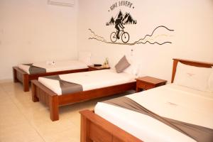 Säng eller sängar i ett rum på El Hotel de los Ciclistas