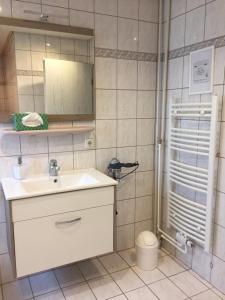 Ванна кімната в Klein Haus 12A