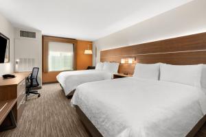 Postel nebo postele na pokoji v ubytování Holiday Inn Express and Suites Sumner by IHG