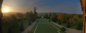 an aerial view of a garden with the sunset in the background at Domaine des Thomins in Cisai-Saint-Aubin