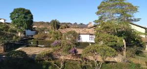 an aerial view of a house with trees at Pousada Pouso da Paz in Tiradentes