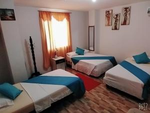 Krevet ili kreveti u jedinici u okviru objekta Hotel San Fernando