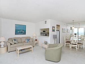 a living room with a couch and a table at Sea Colony Brandywine House II in Bethany Beach