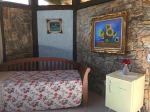 Cama o camas de una habitación en Pousada Rocamadour